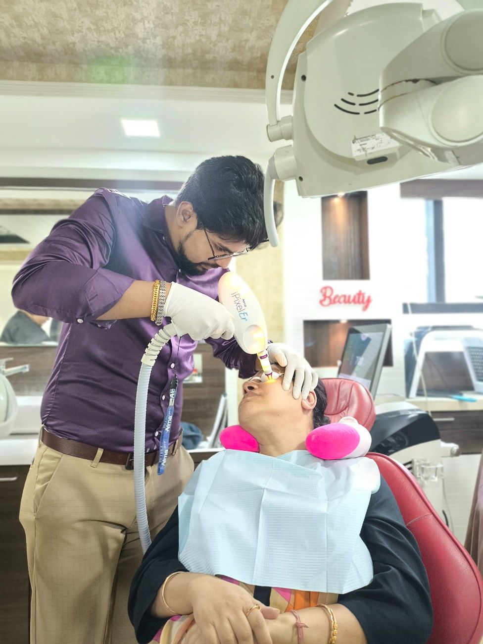 Dermatologist performing skin treatment on a patient at Dontia Care Clinic Skin and Hair in Kolkata