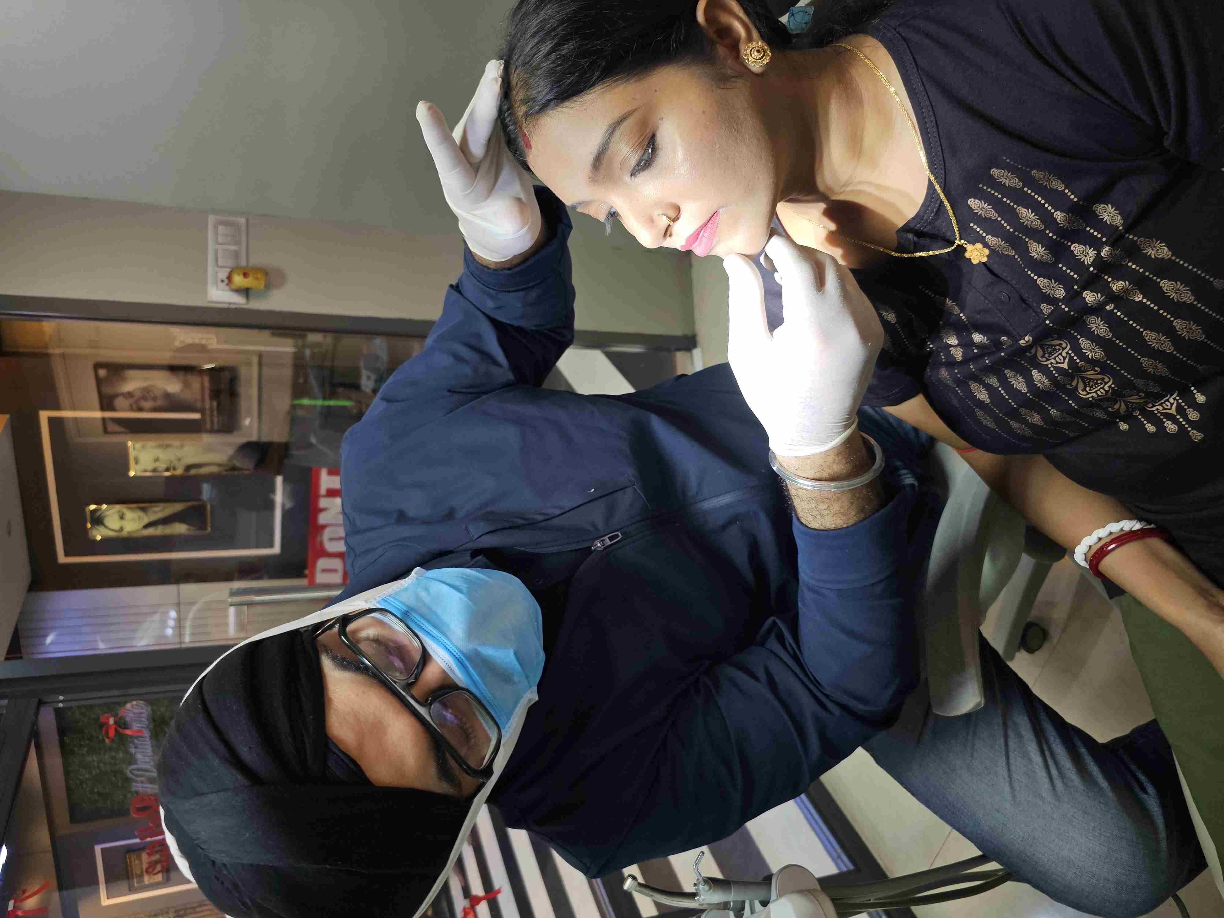 TMJ specialist examining a patient — jaw pain and joint assessment in Kolkata.